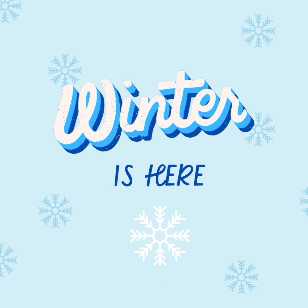 Light blue background with randomly placed medium dark blue snowflakes. White and blue text in the centre reads “Winter is here”. White snowflake in the centre below the text. 